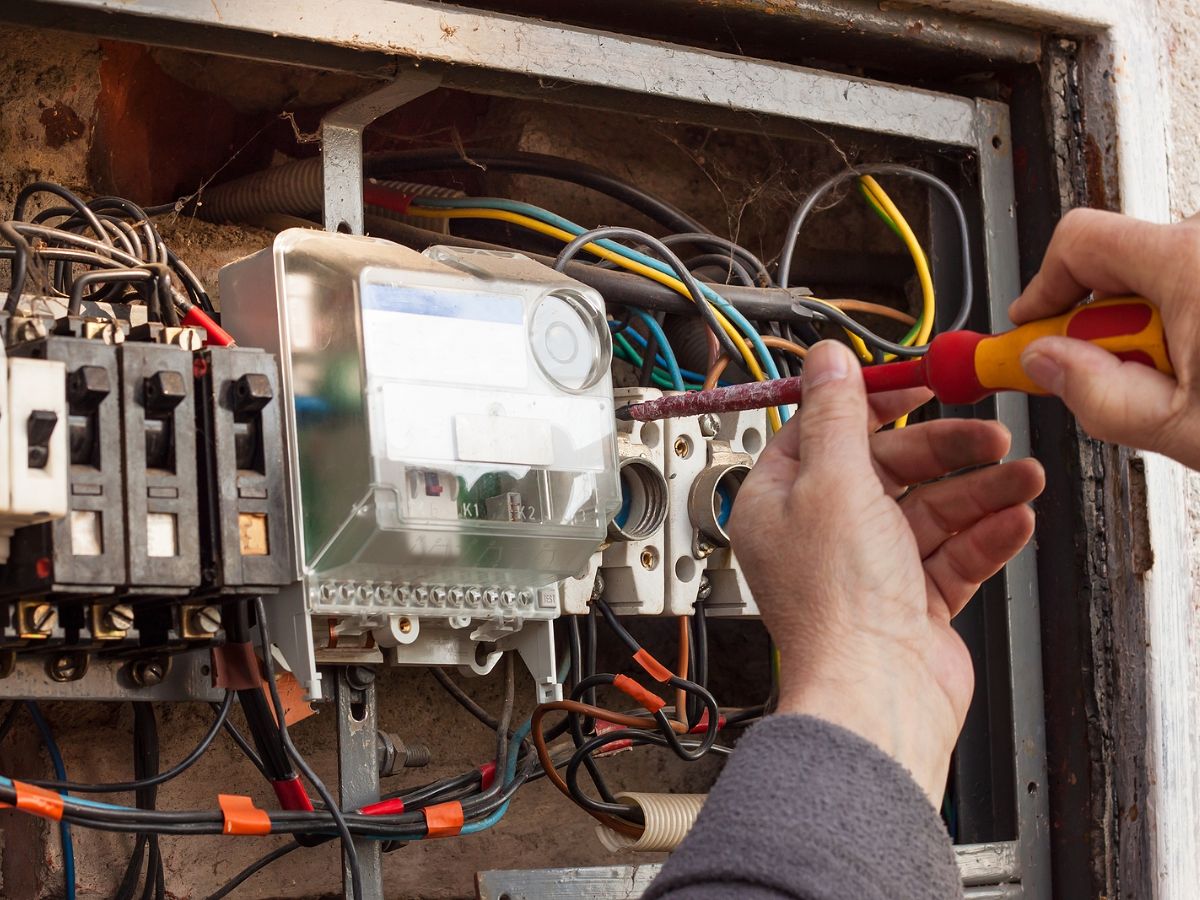 Repairs being made to old electrical system.